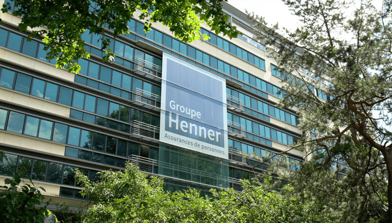 Photo de la façade d'immeuble du groupe Henner