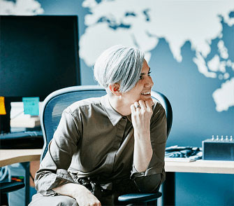 Woman on her work chair, talking to someone